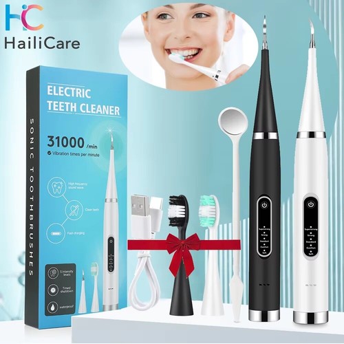 Ultrasonic tooth cleaner - ultrasonic,